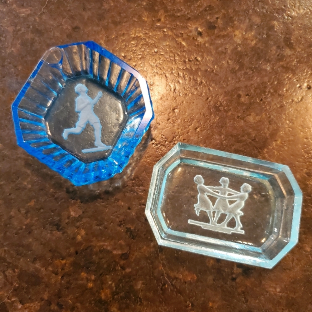 2 vintage '30s pressed glass ashtrays/salt cellars with etched child motif